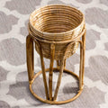 Rattan plant stand on legs with basket