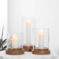 Wood and glass candle holder set of 3 on tabletop